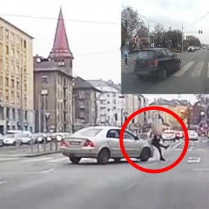 VIDEÓ: Hatalmas ugrással próbálta menteni magát a telefonáló gyalogos Budán