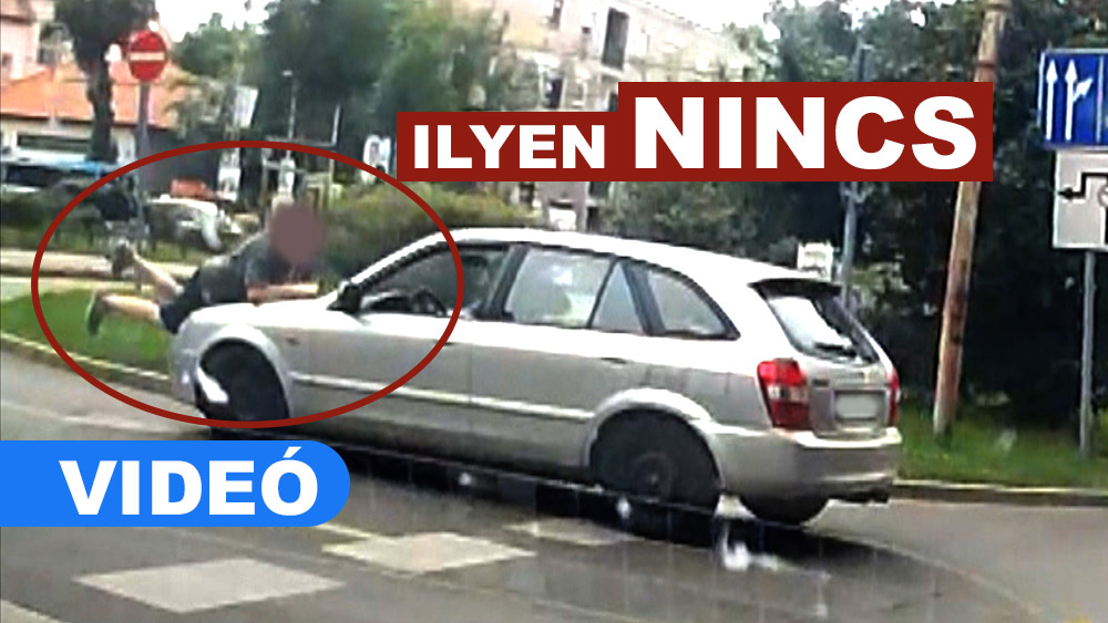 A motorháztetőn vonszolta, miután elindult autójával. Videón a két sofőr viaskodása
